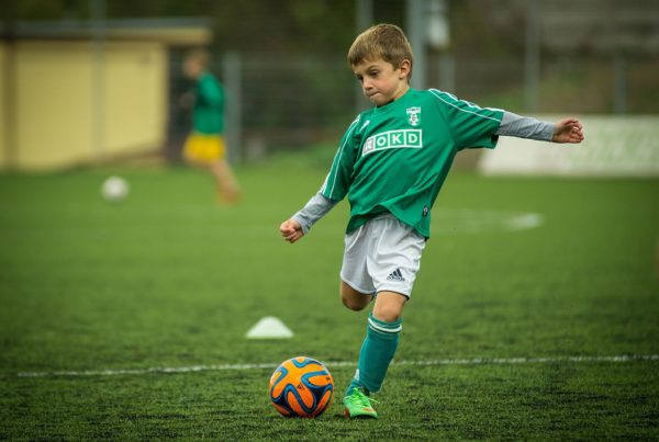 children playing soccer
